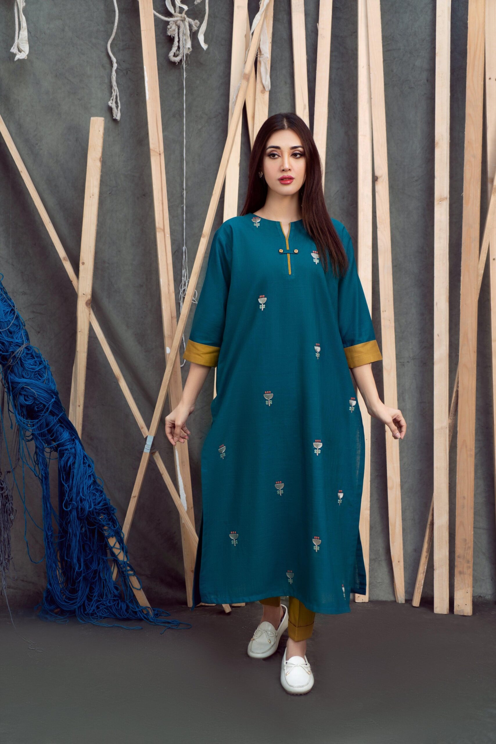 Elegant Embroidered Lawn 2PC Suit with delicate front and sleeve embroidery